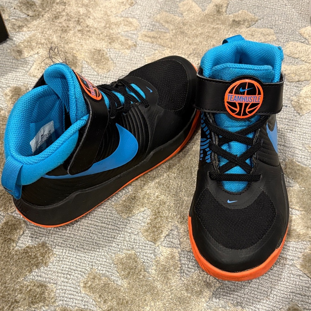 Nike Kids Sneakers - Black, Blue, and Orange
Like New Team Hustle D9